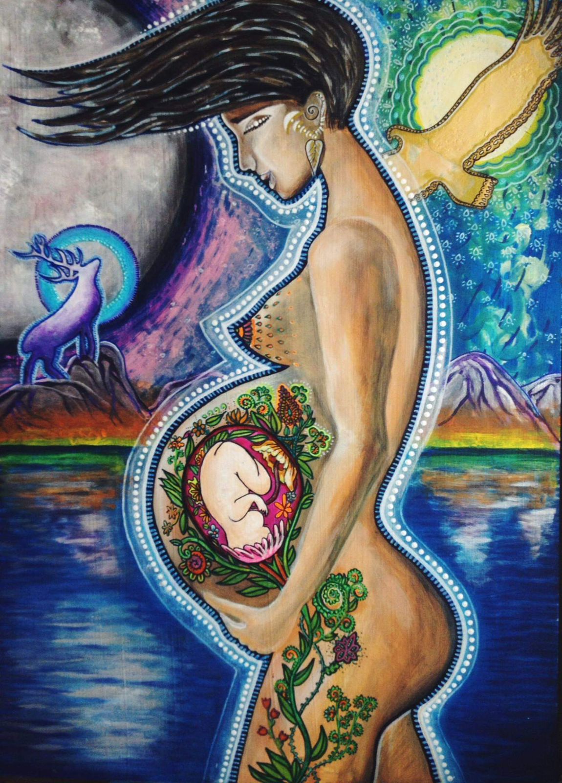 Sacred pregnancy portrait with deer and cosmic elements